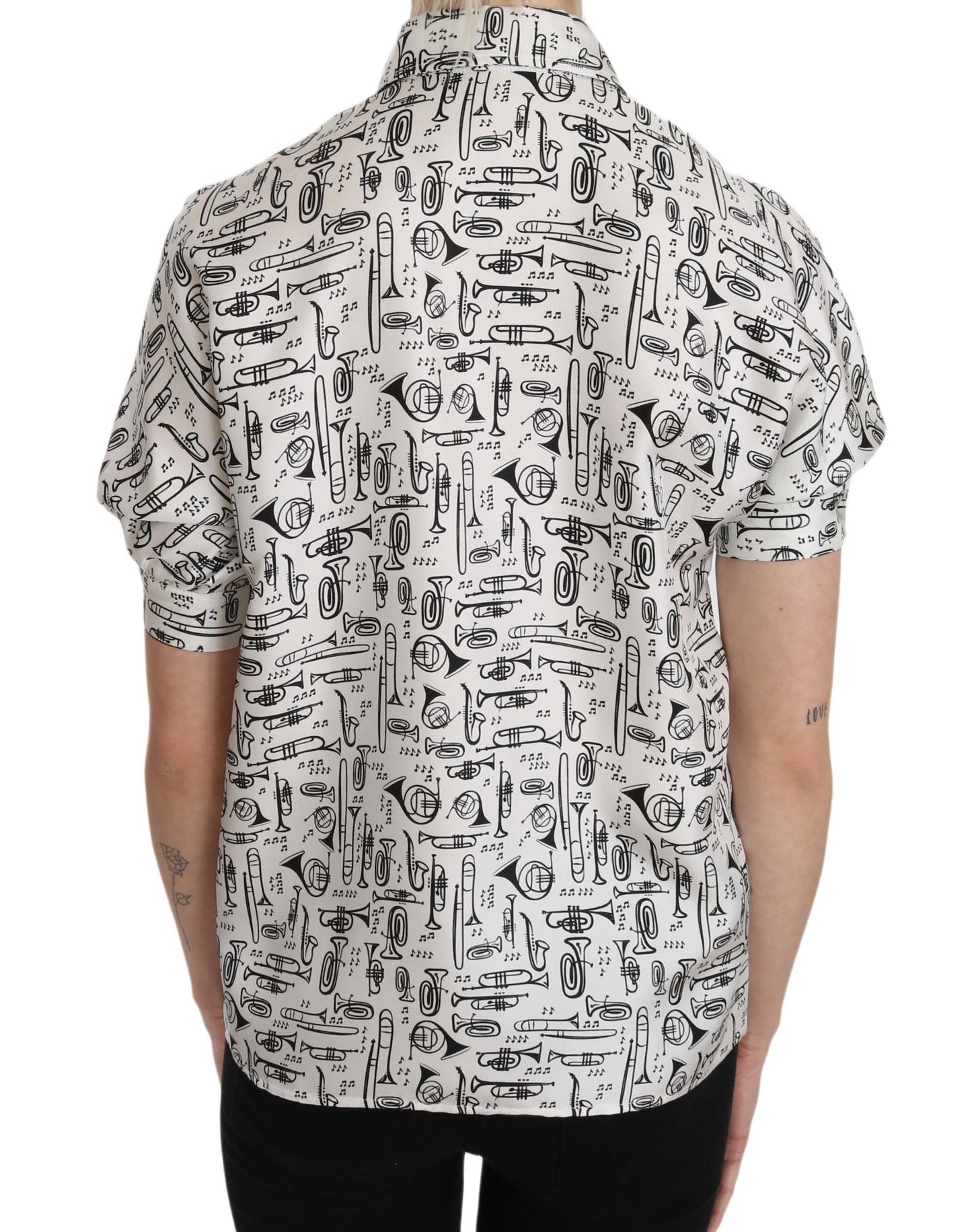 Dolce & Gabbana Elegante blusa de seda con estampado de trompeta
