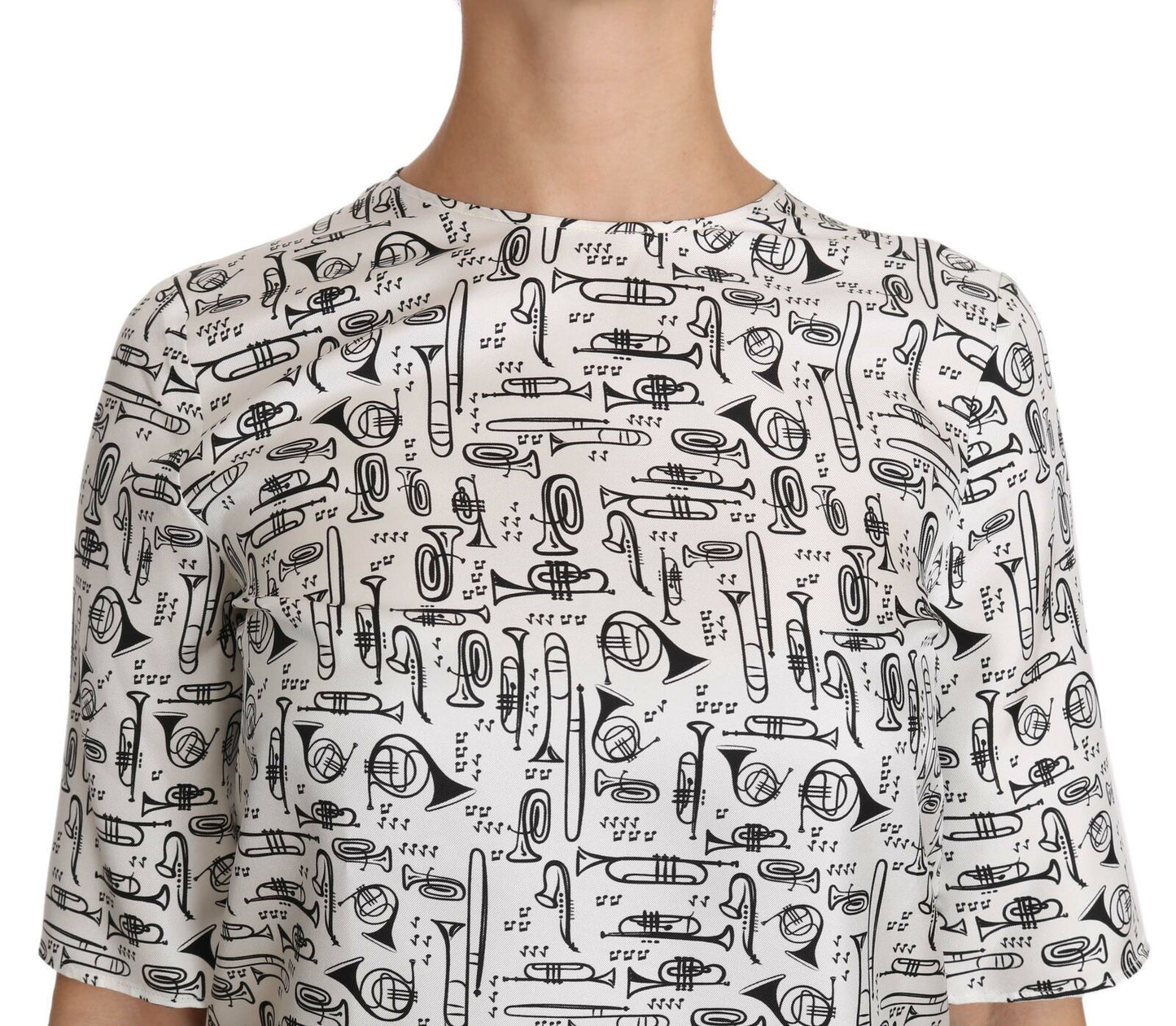 Dolce & Gabbana Top elegante blusa de seda con estampado de trompeta