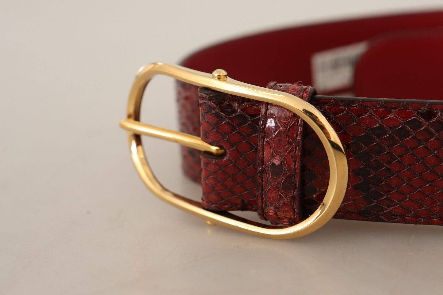 Dolce & Gabbana Elegante cinturón de piel de serpiente rojo