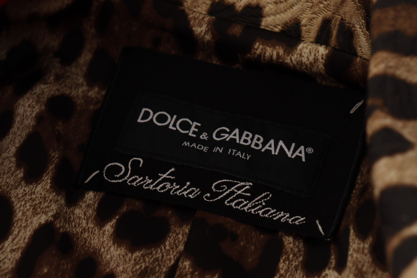 Dolce & Gabbana Elegante gabardina de leopardo rojo