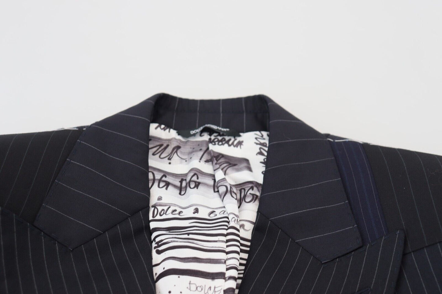 Dolce & Gabbana Elegante blazer de lana con doble botonadura azul marino