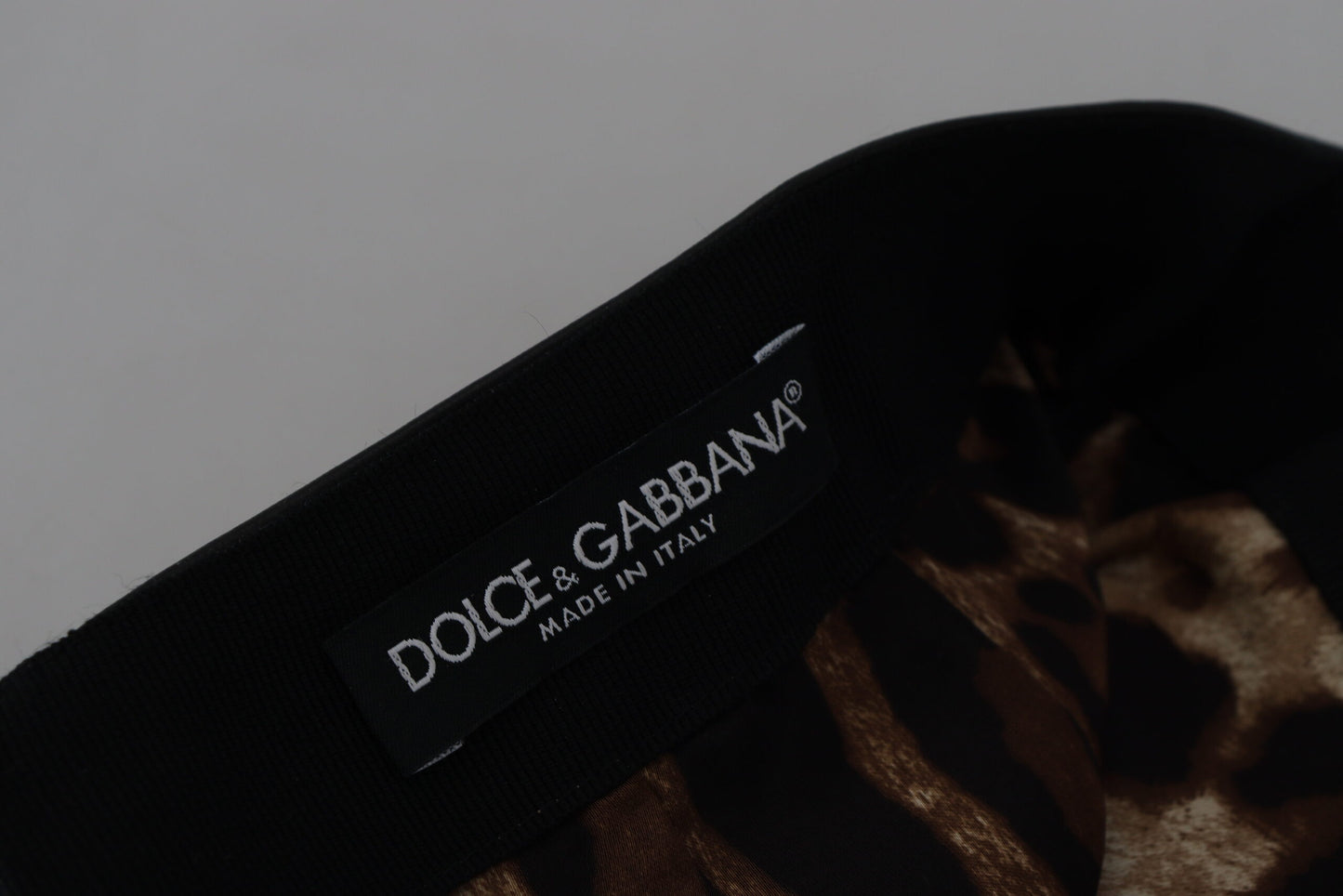Dolce & Gabbana Minifalda elegante de cuero con corte en A y cintura alta