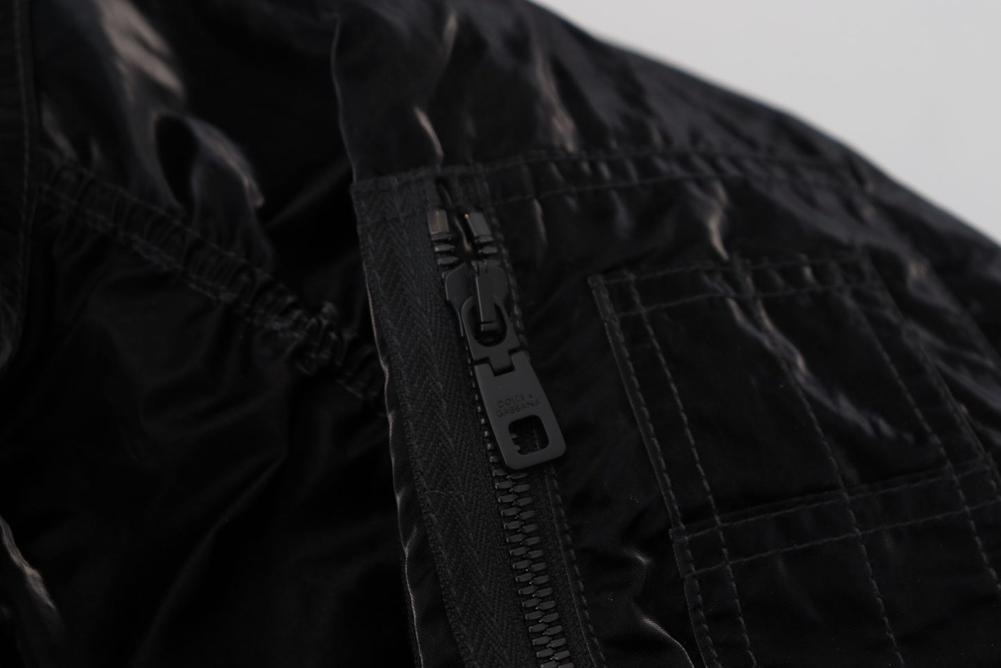 Dolce & Gabbana Elegante chaqueta bomber negra con capucha