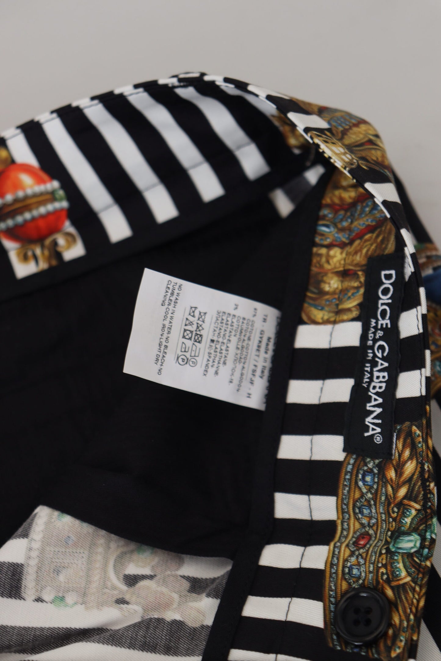 Dolce & Gabbana Pantalones chinos elegantes con rayas y corona dorada