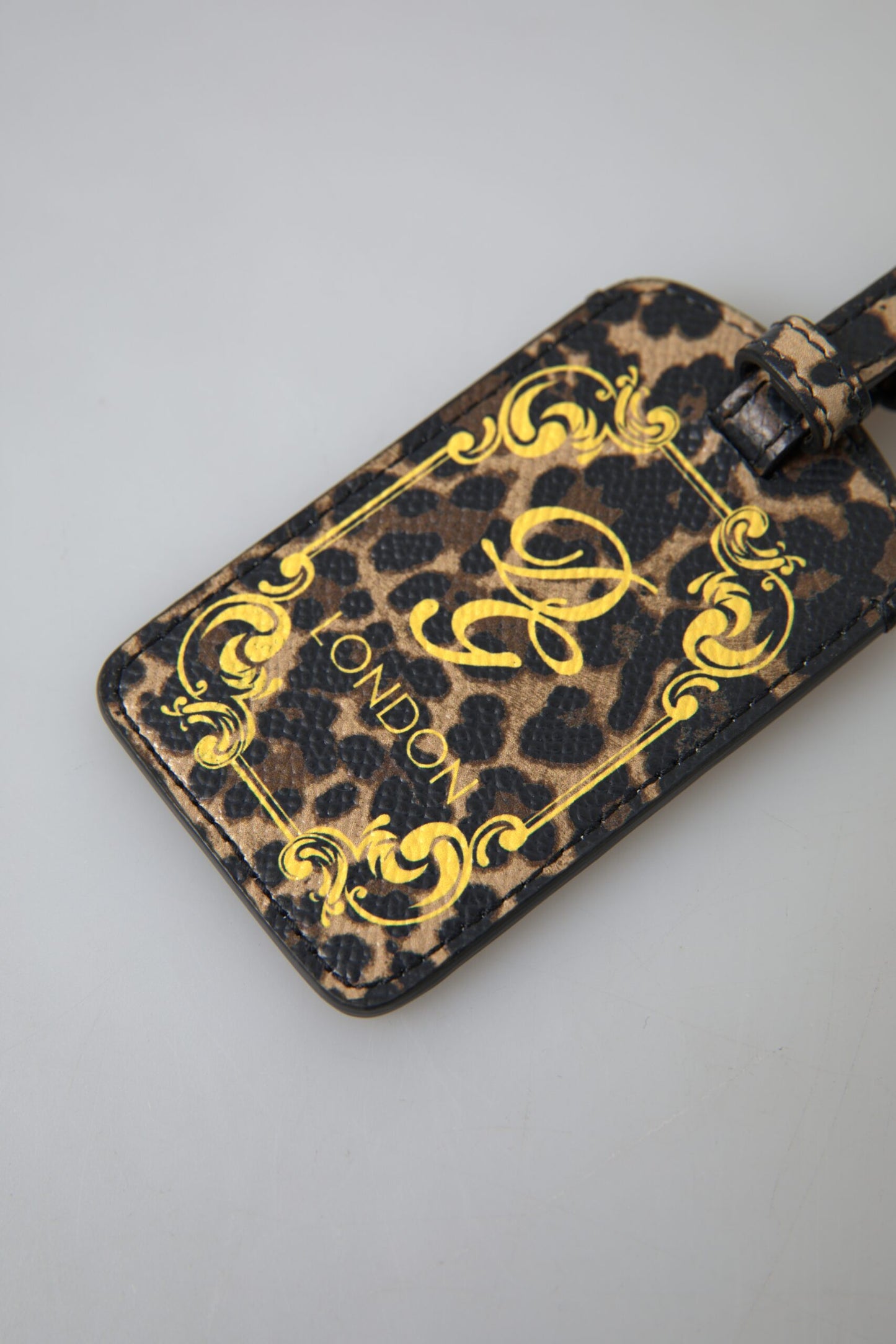 Dolce & Gabbana Etiqueta de equipaje elegante de piel de leopardo
