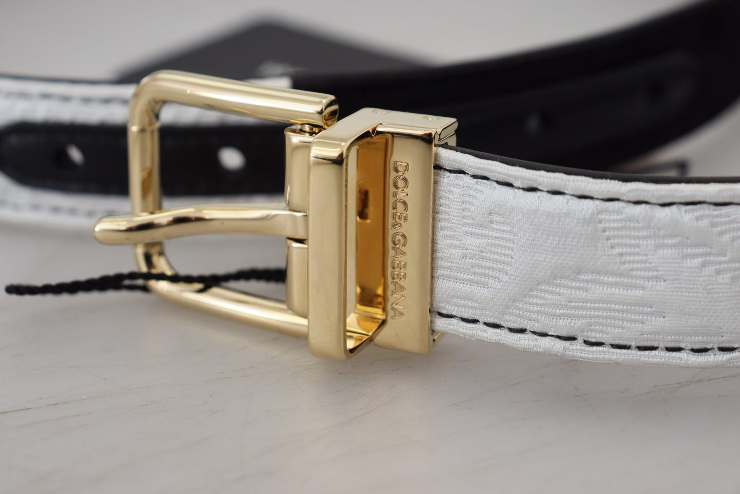 Dolce & Gabbana Cinturón con hebilla de metal dorado con patchwork blanco y negro
