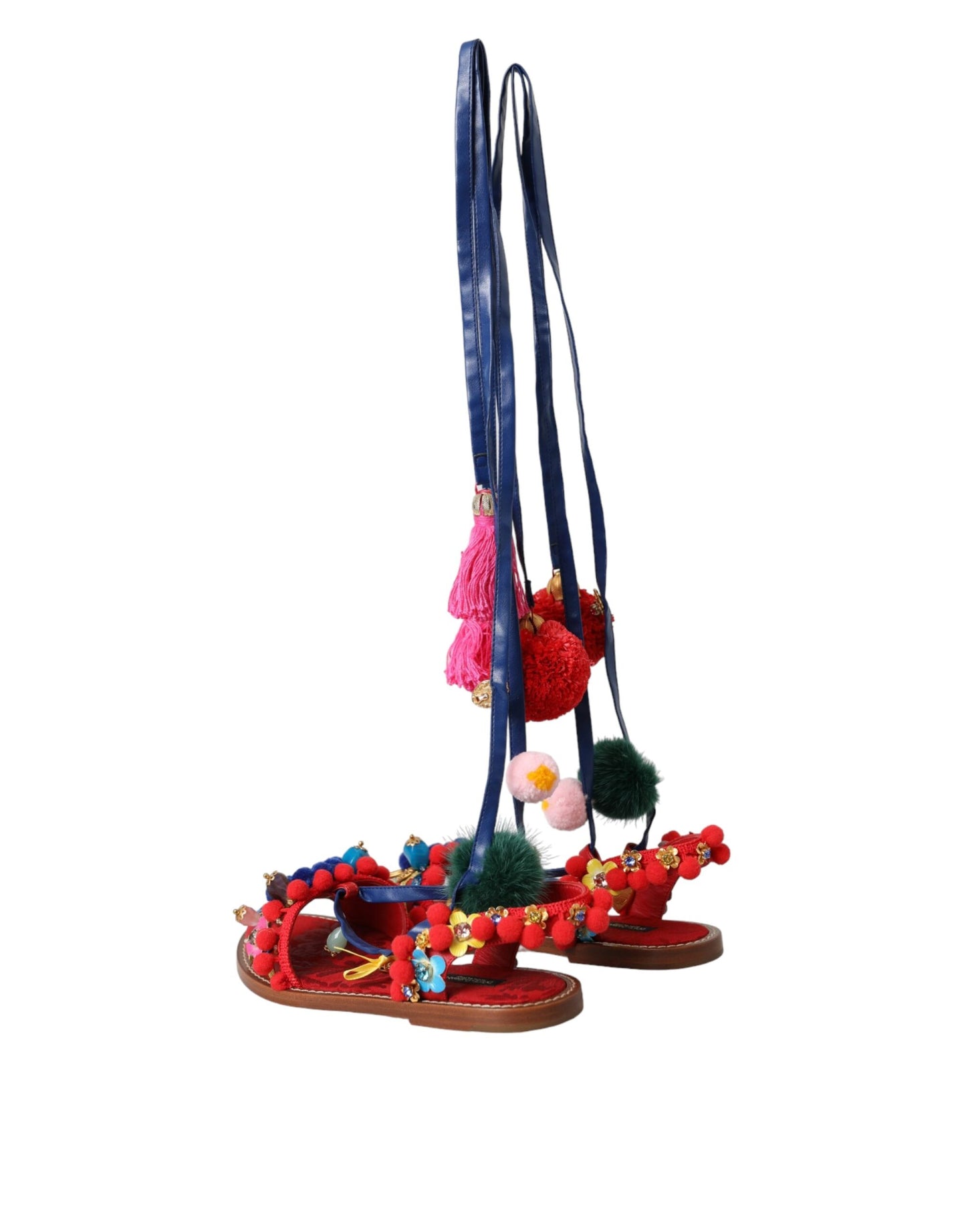 Dolce & Gabbana Sandalias cruzadas de piel con pompones multicolores Zapatos