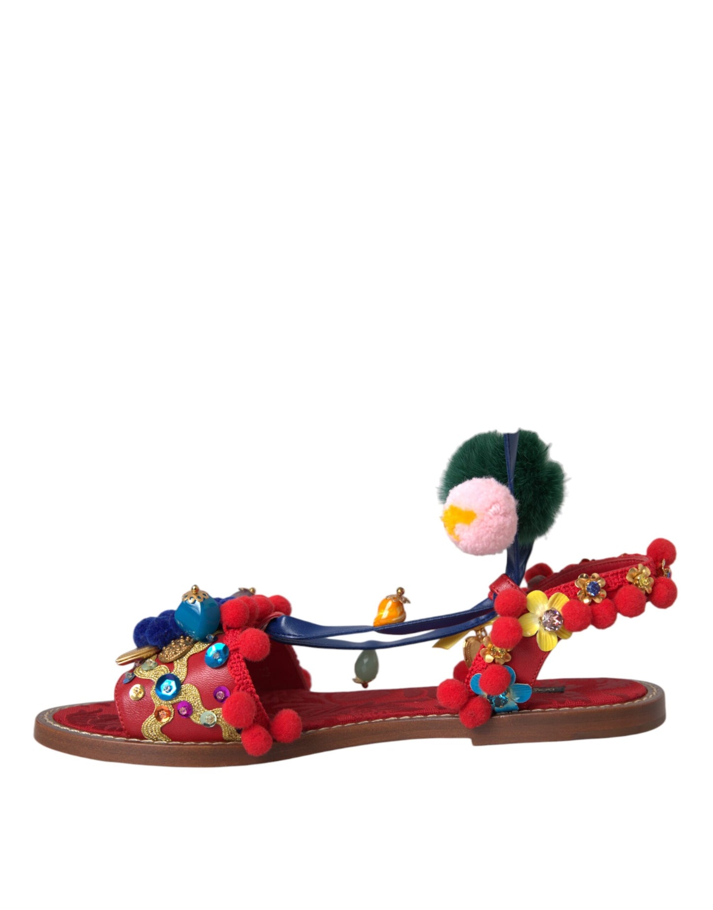 Dolce & Gabbana Sandalias cruzadas de piel con pompones multicolores Zapatos