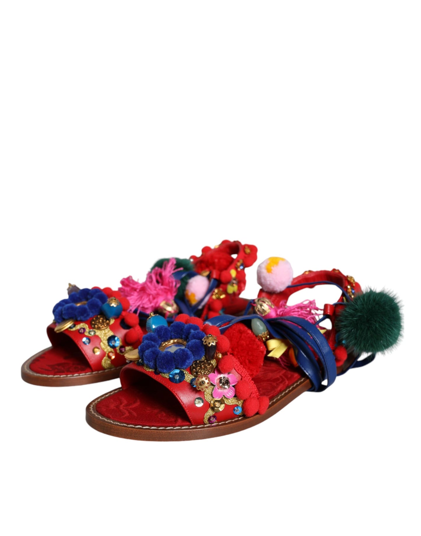 Dolce & Gabbana Sandalias cruzadas de piel con pompones multicolores Zapatos
