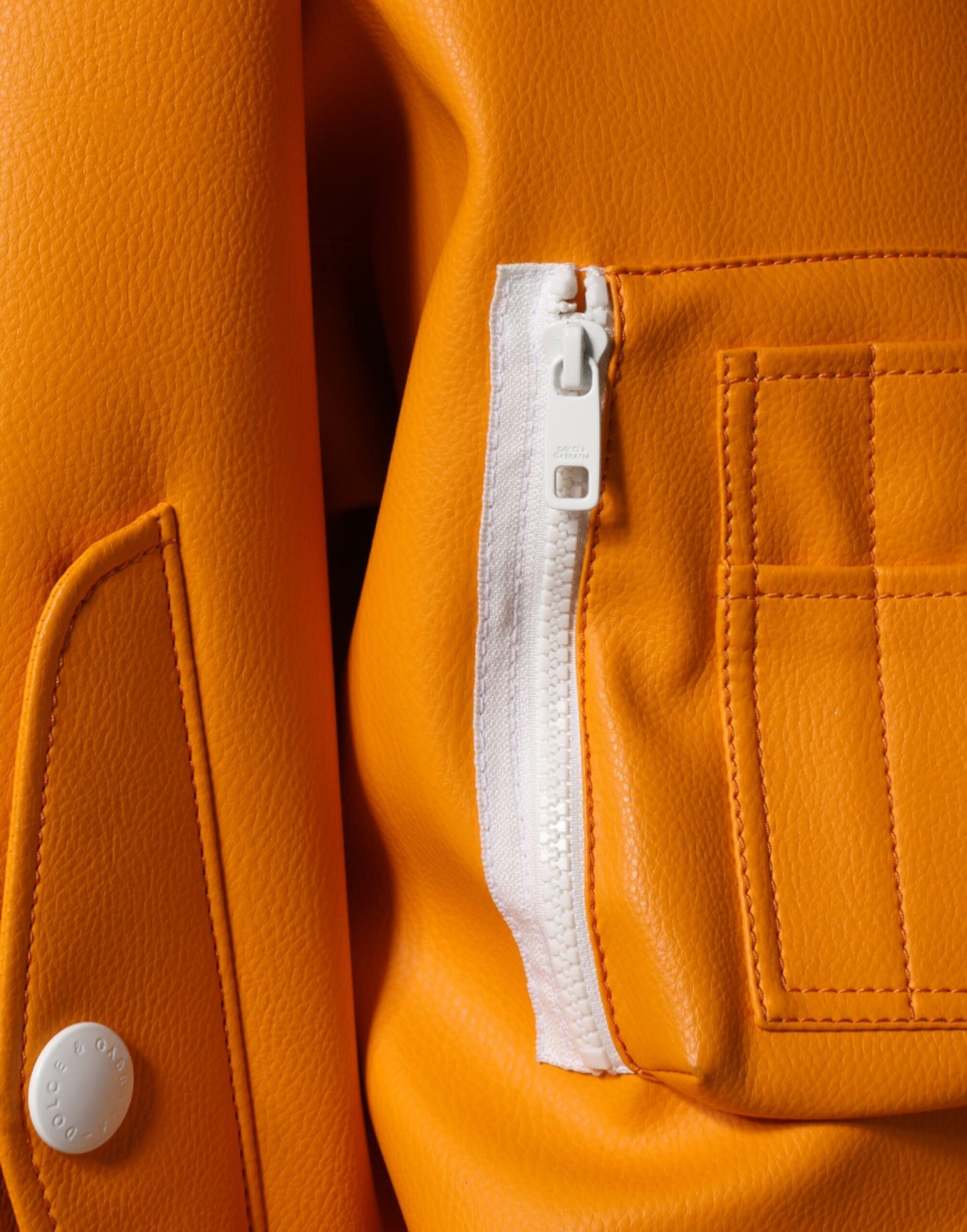 Dolce & Gabbana Chaqueta bomber de punto con cremallera completa en color naranja y blanco