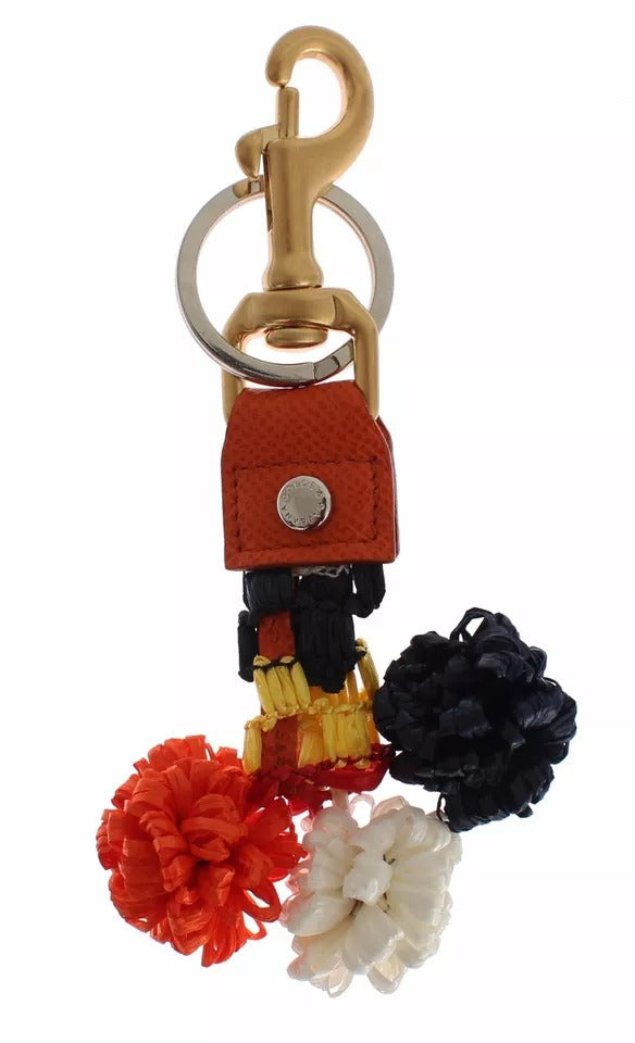 Llavero con cadena y cierre de rafia en cuero marrón y dorado de Dolce & Gabbana