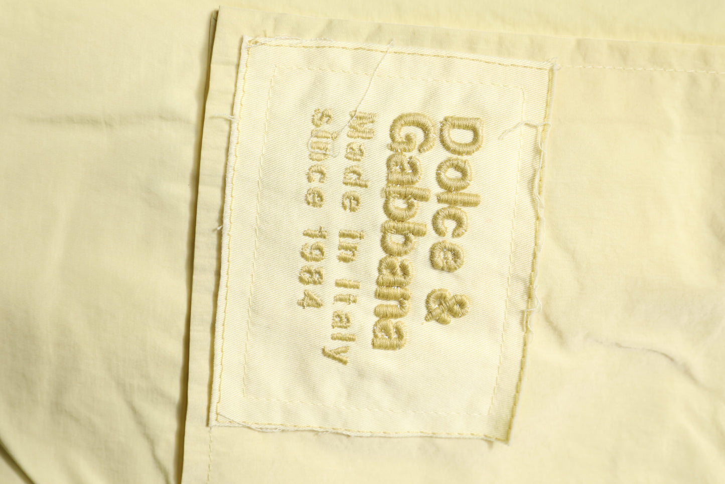 Pantalones deportivos Dolce & Gabbana con cadena de nailon amarillo para hombre