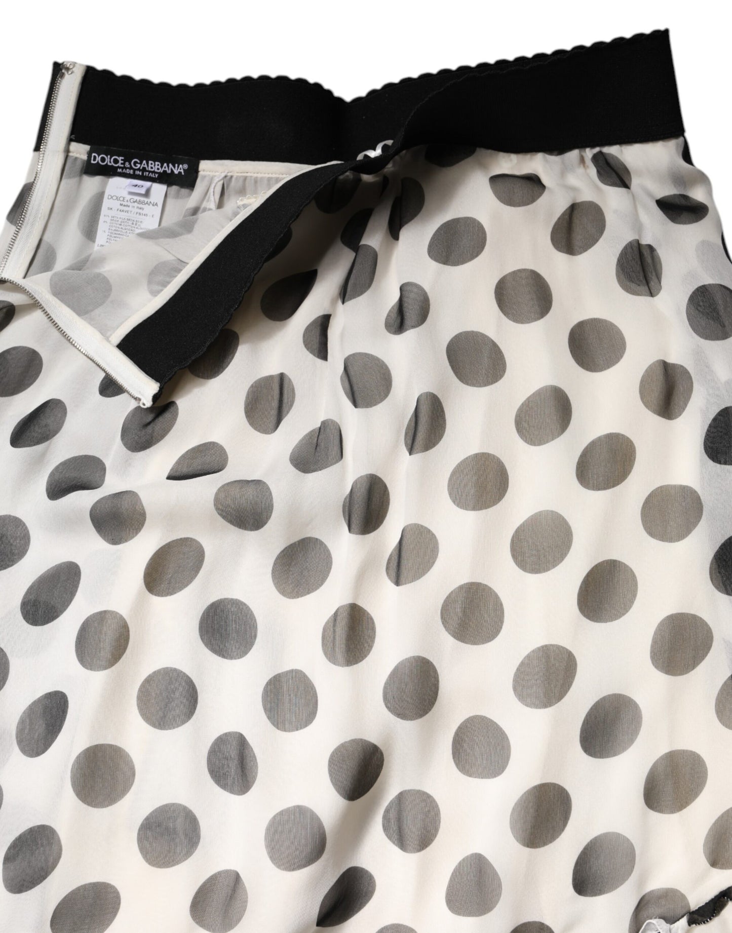Falda hasta la rodilla con lunares blancos y negros de Dolce & Gabbana