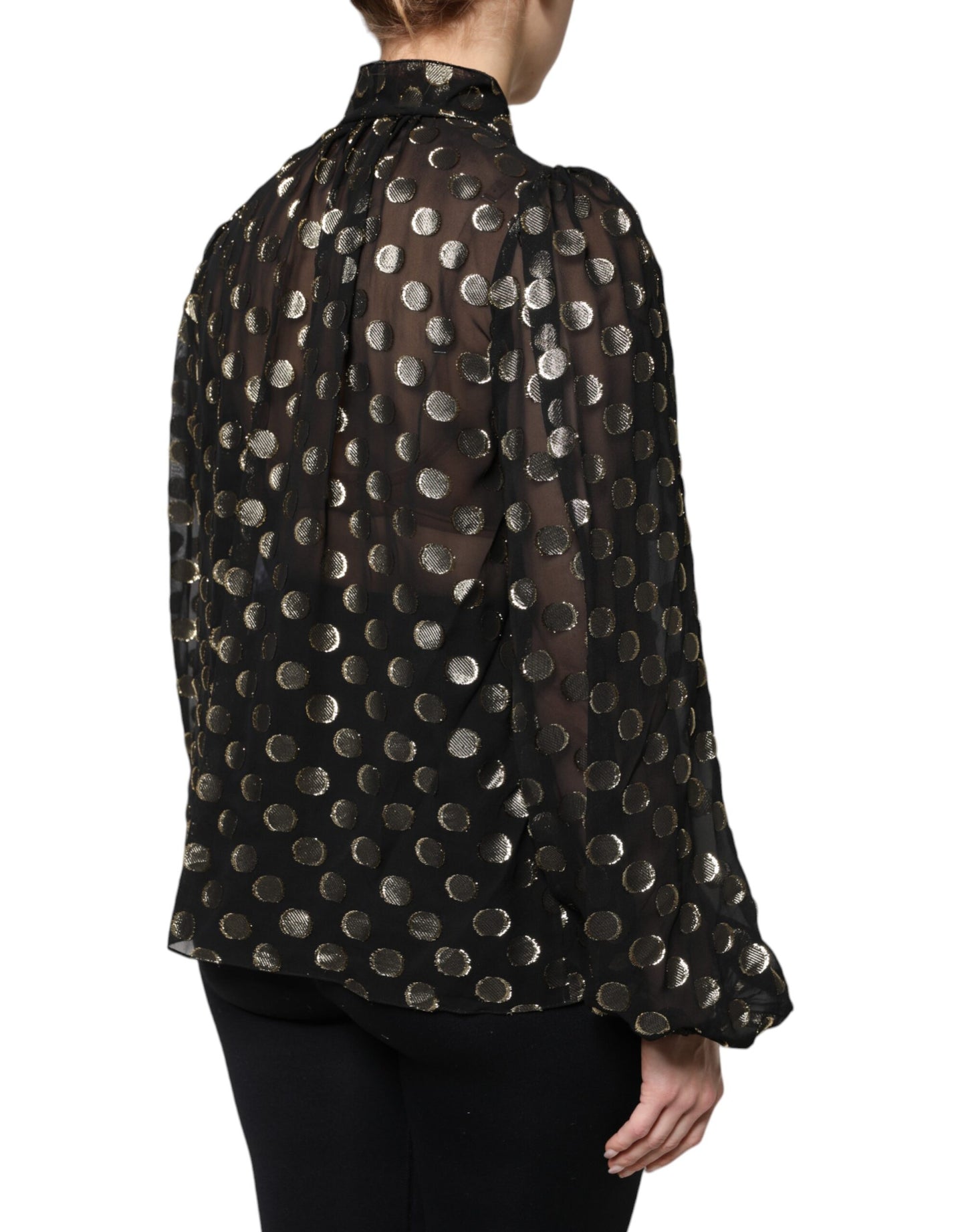 Blusa negra transparente con lunares y cuello anudado de Dolce & Gabbana