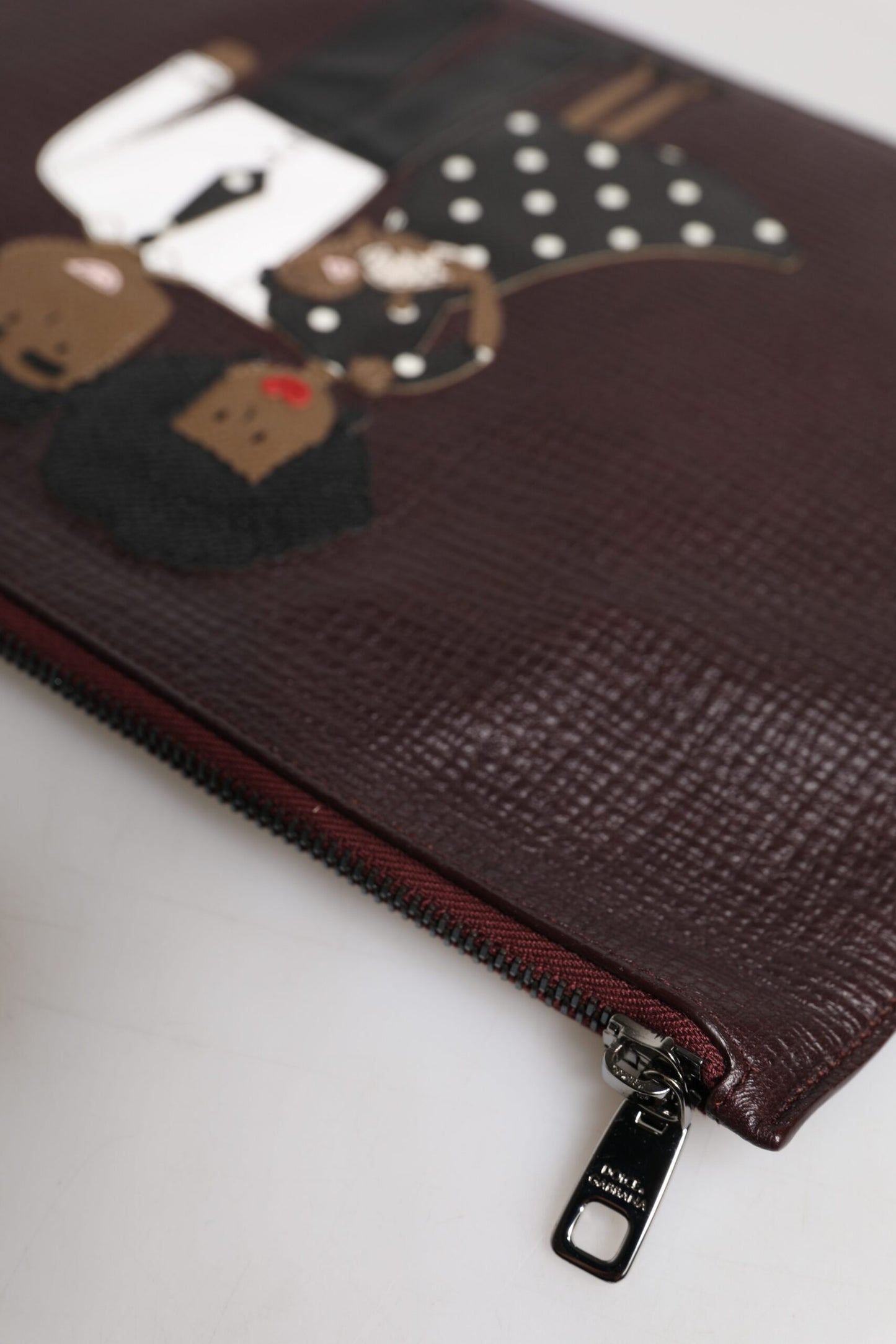 Bolso de mano para hombre de piel marrón adornado #DGFAMILY de Dolce & Gabbana