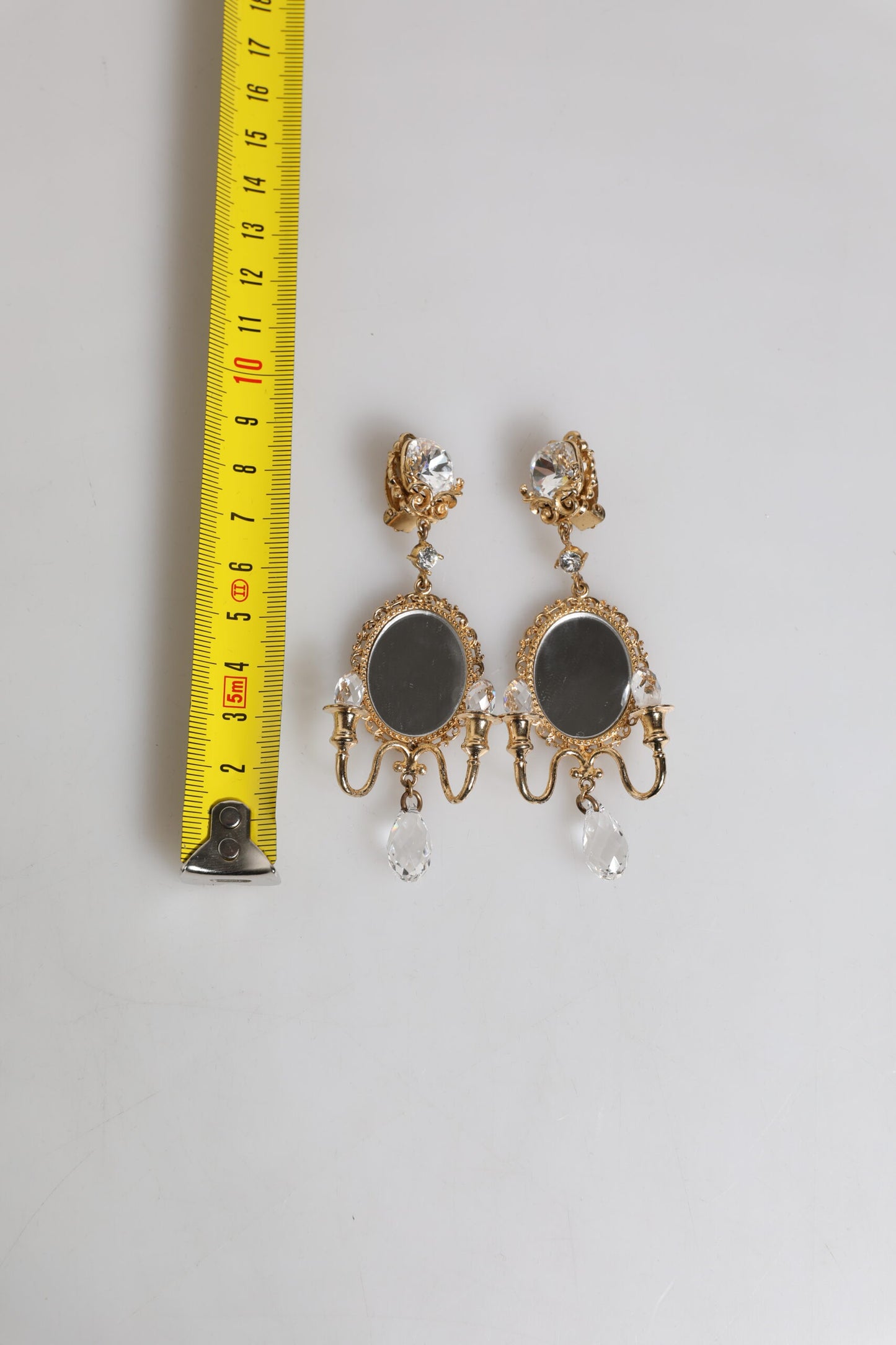 Boucles d'oreilles pendantes Dolce & Gabbana en laiton doré et cristal transparent avec élément miroir