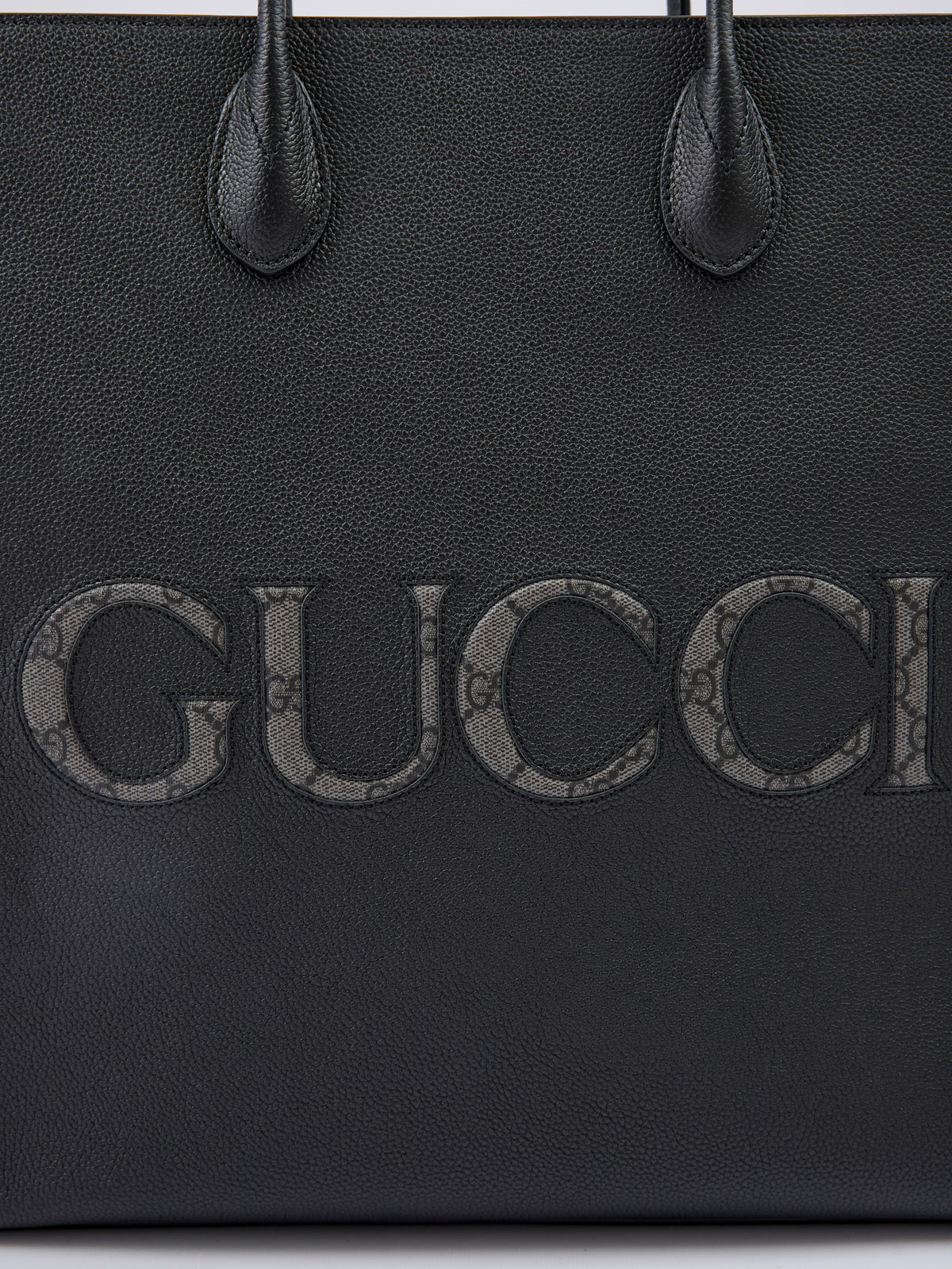 Sac fourre-tout moyen en cuir noir avec logo Gucci