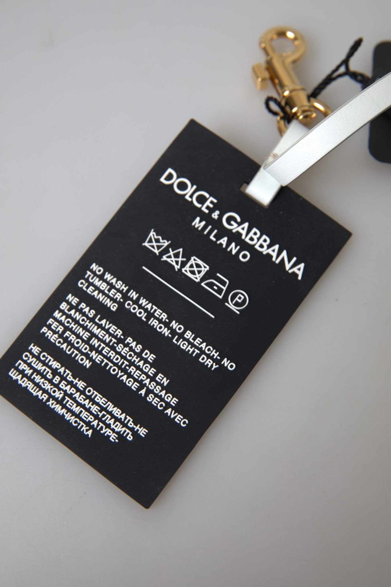 Dolce & Gabbana Black Silicone DG Logo Gold Brass Keychain – par Dolce & Gabbana | Disponible sur Sandy Store ByNet