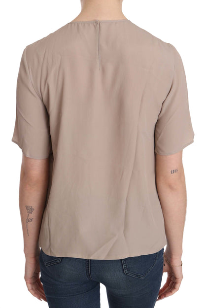 Dolce &amp; Gabbana Elegante blusa con cuello redondo en mezcla de seda beige
