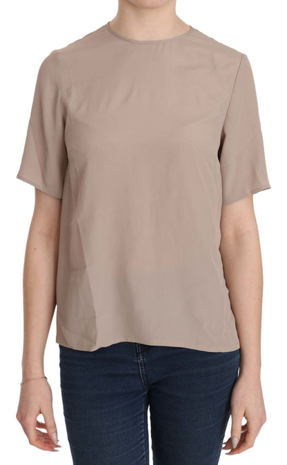 Dolce &amp; Gabbana Elegante blusa con cuello redondo en mezcla de seda beige