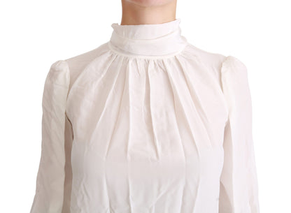Dolce &amp; Gabbana Elegante blusa de seda blanca con cuello alto
