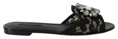 Dolce &amp; Gabbana Elegantes mulas de encaje negro con detalle de flor joya