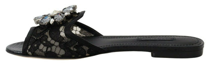 Dolce &amp; Gabbana Elegantes mulas de encaje negro con detalle de flor joya