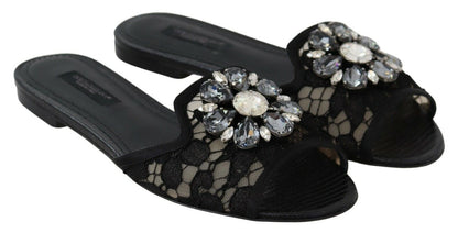 Dolce &amp; Gabbana Elegantes mulas de encaje negro con detalle de flor joya