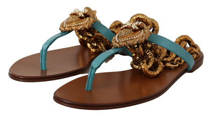 Chaussures plates gladiateur chic Dolce &amp; Gabbana avec détail cœur dévotionnel