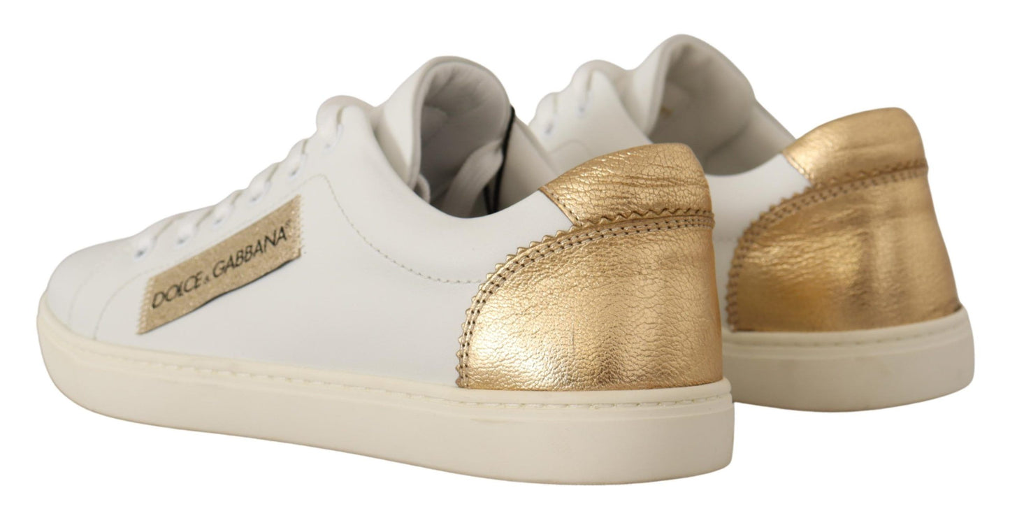 Dolce &amp; Gabbana Elegantes zapatillas deportivas de cuero blanco con detalles dorados