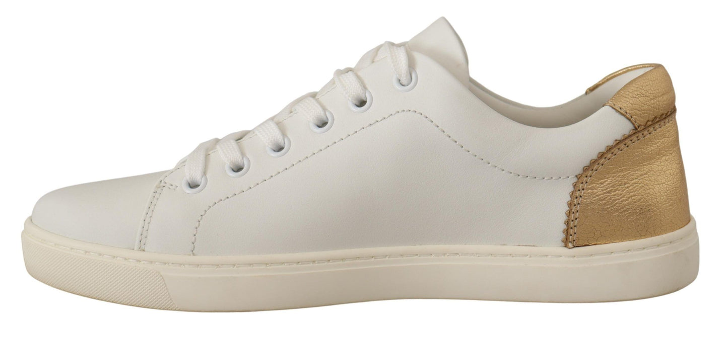 Dolce &amp; Gabbana Elegantes zapatillas deportivas de cuero blanco con detalles dorados