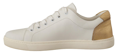 Dolce &amp; Gabbana Elegantes zapatillas deportivas de cuero blanco con detalles dorados