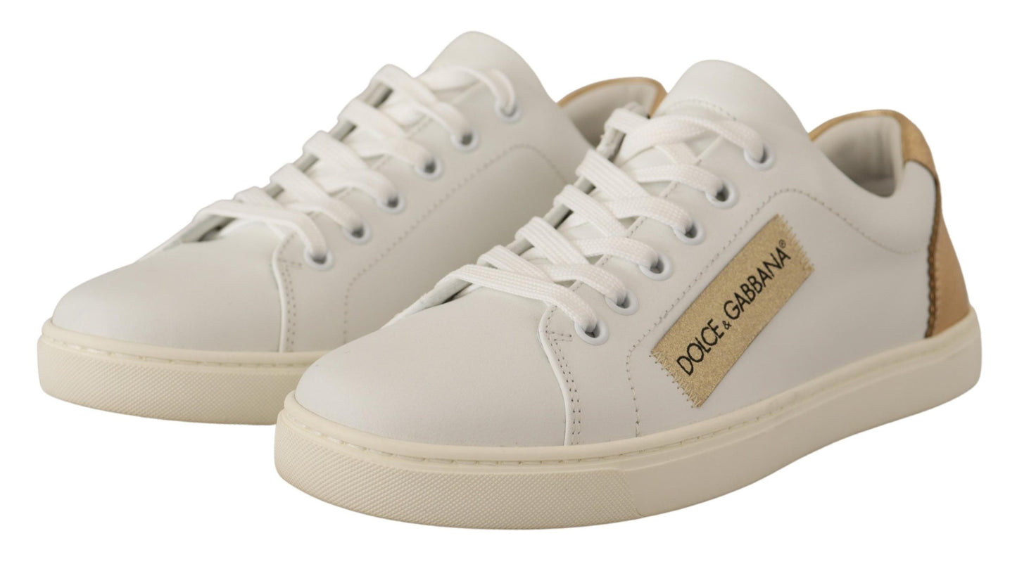 Dolce &amp; Gabbana Elegantes zapatillas deportivas de cuero blanco con detalles dorados