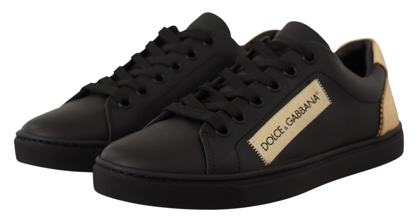 Zapatillas bajas elegantes de cuero negro y dorado de Dolce &amp; Gabbana
