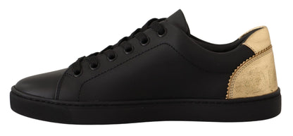 Zapatillas bajas elegantes de cuero negro y dorado de Dolce &amp; Gabbana