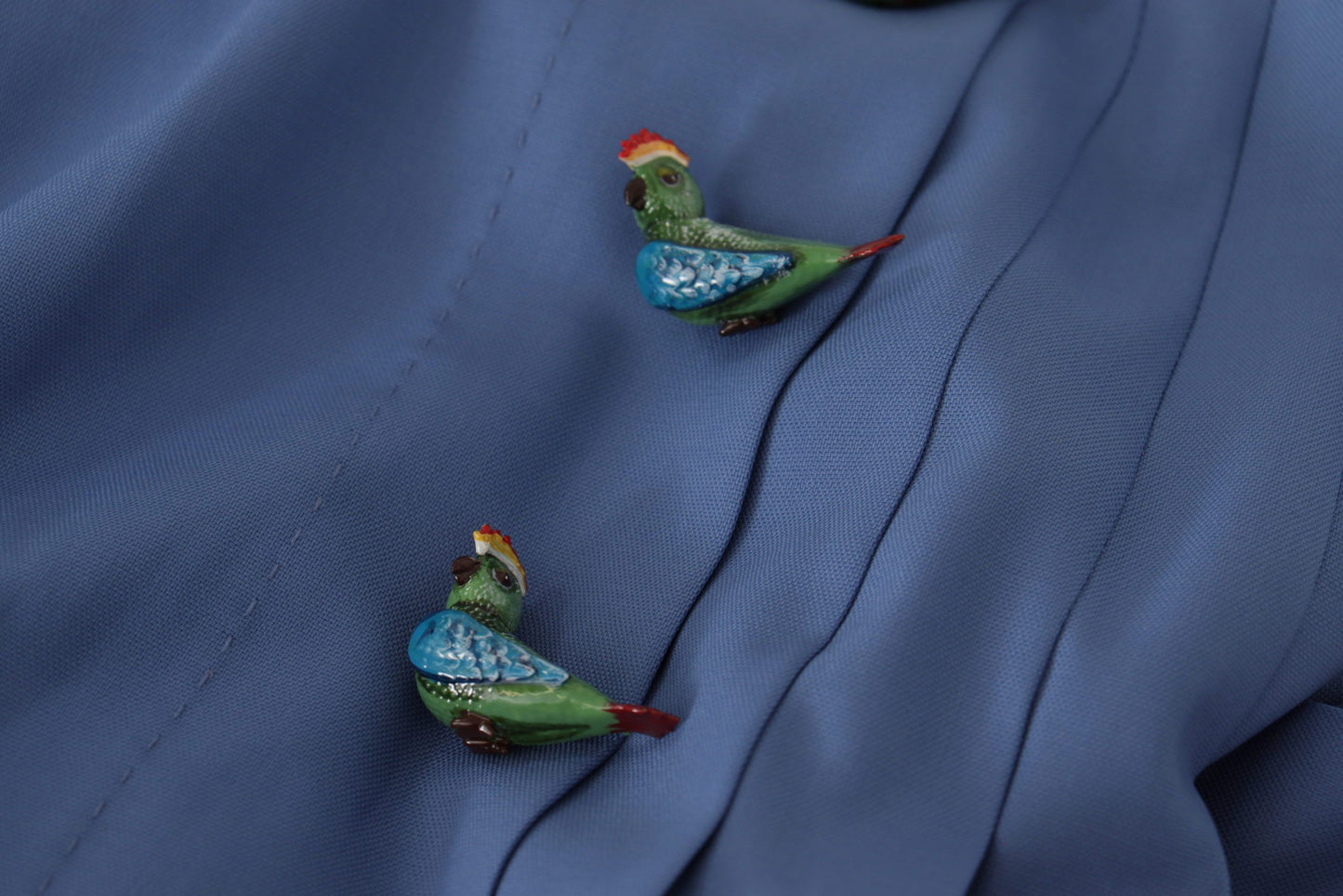 Dolce &amp; Gabbana Minifalda plisada elegante de corte A con apliques de pájaros