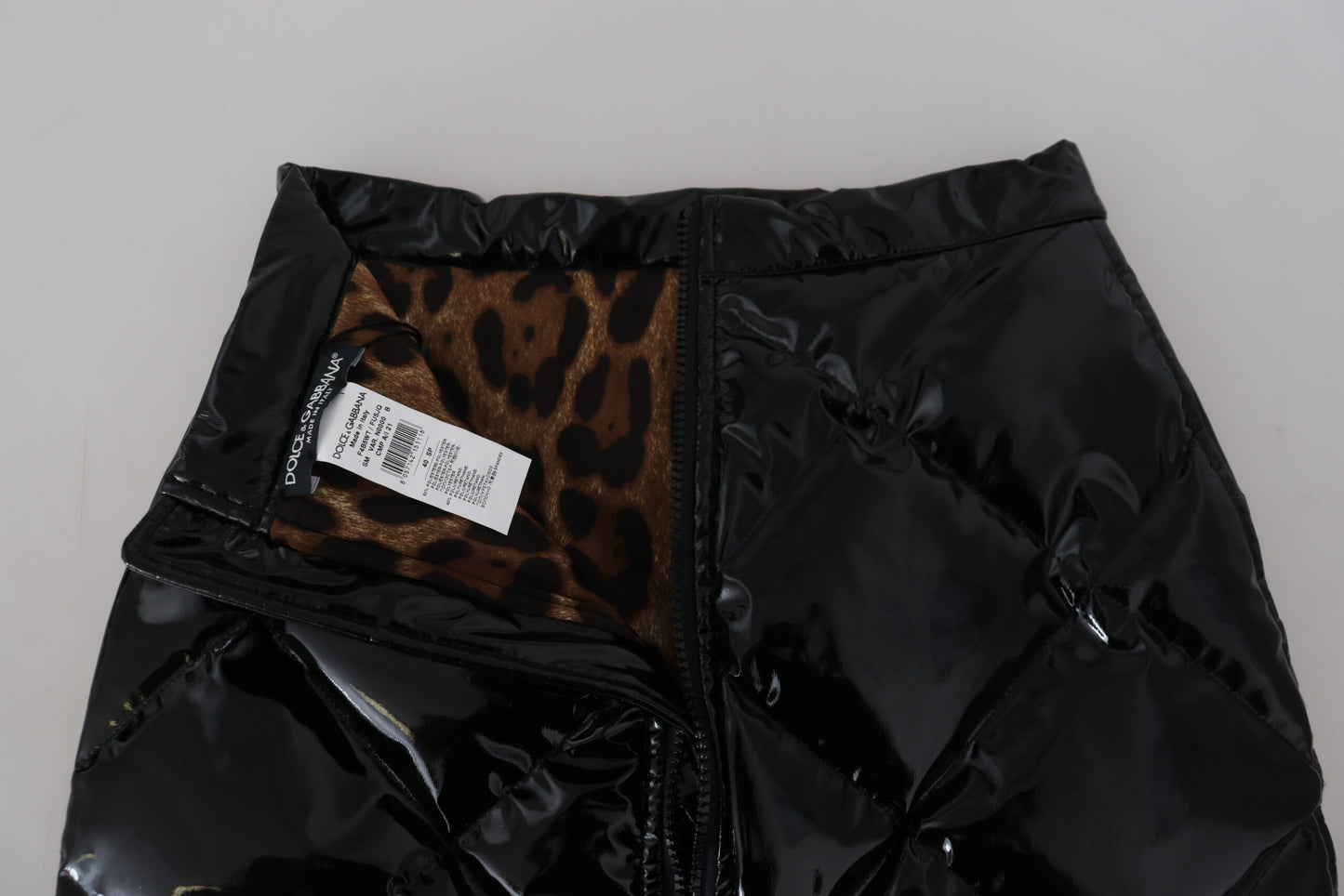 Dolce &amp; Gabbana Minifalda elegante de cintura alta en negro brillante