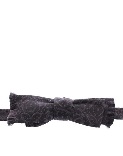 Dolce &amp; Gabbana Pajarita elegante en mezcla de lana y seda negra Paisley