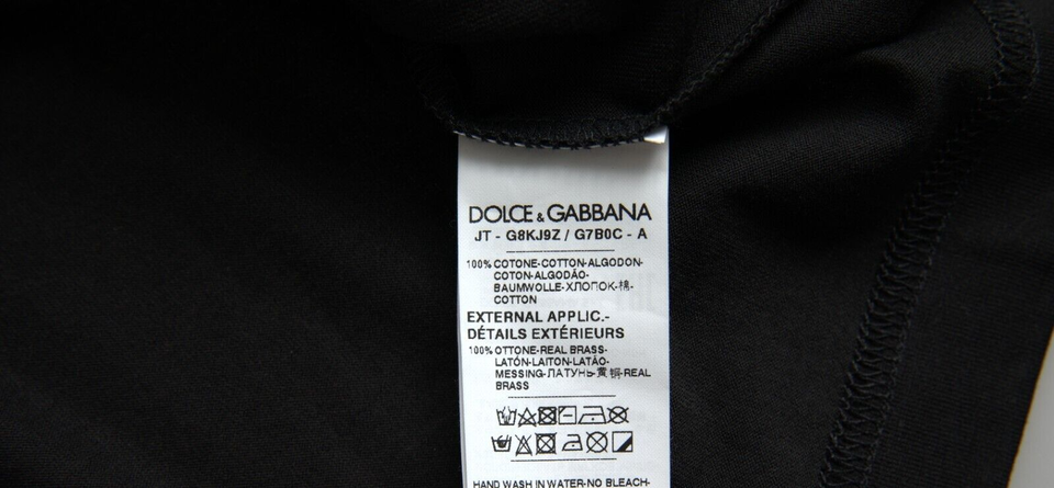 Dolce &amp; Gabbana Elegante camiseta negra de algodón con cuello redondo y detalle de placa de identificación