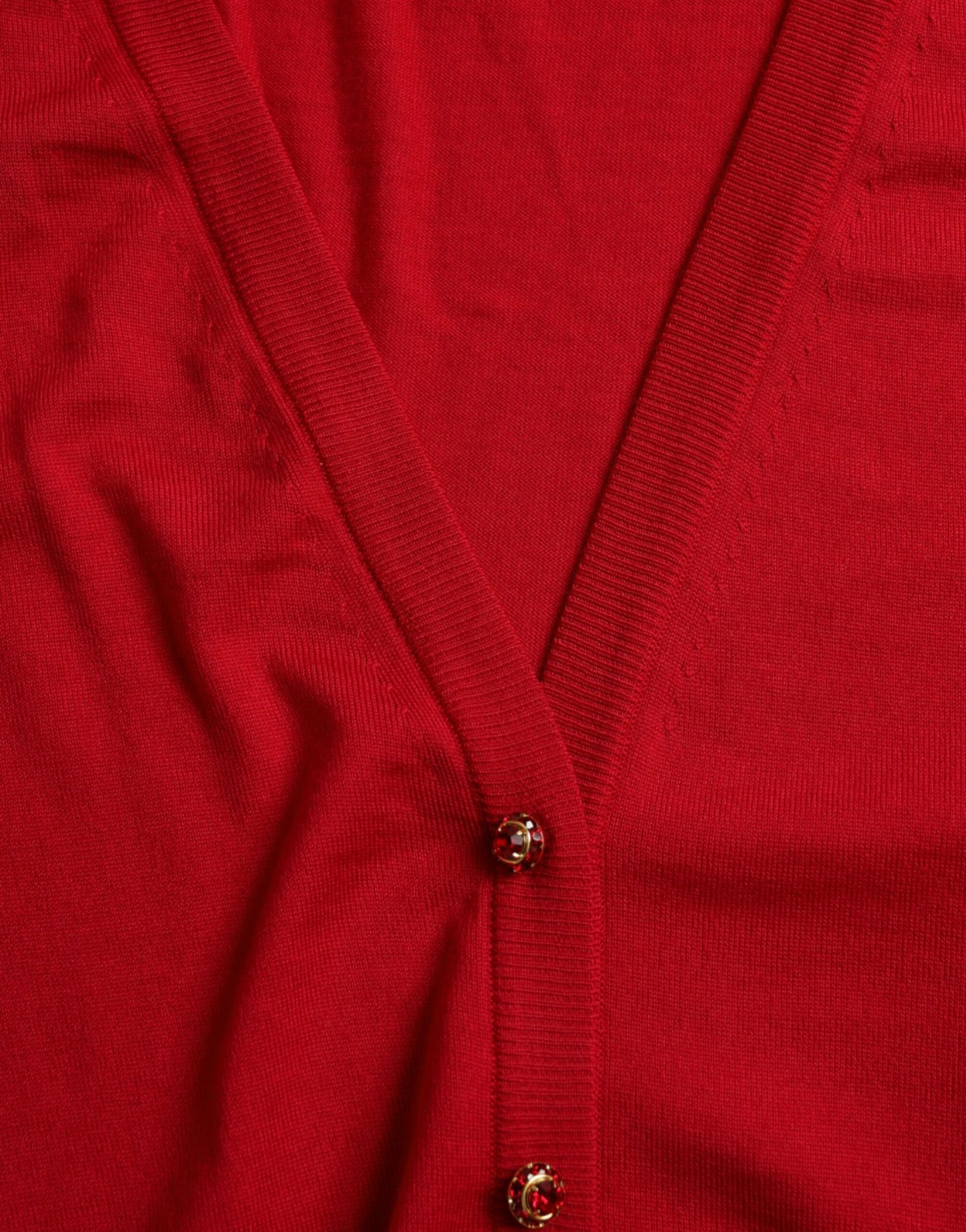 Dolce &amp; Gabbana Elegante cárdigan rojo de lana con cuello de pico