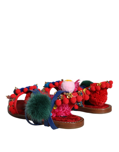 Dolce &amp; Gabbana Sandalias cruzadas de piel con pompones multicolores Zapatos