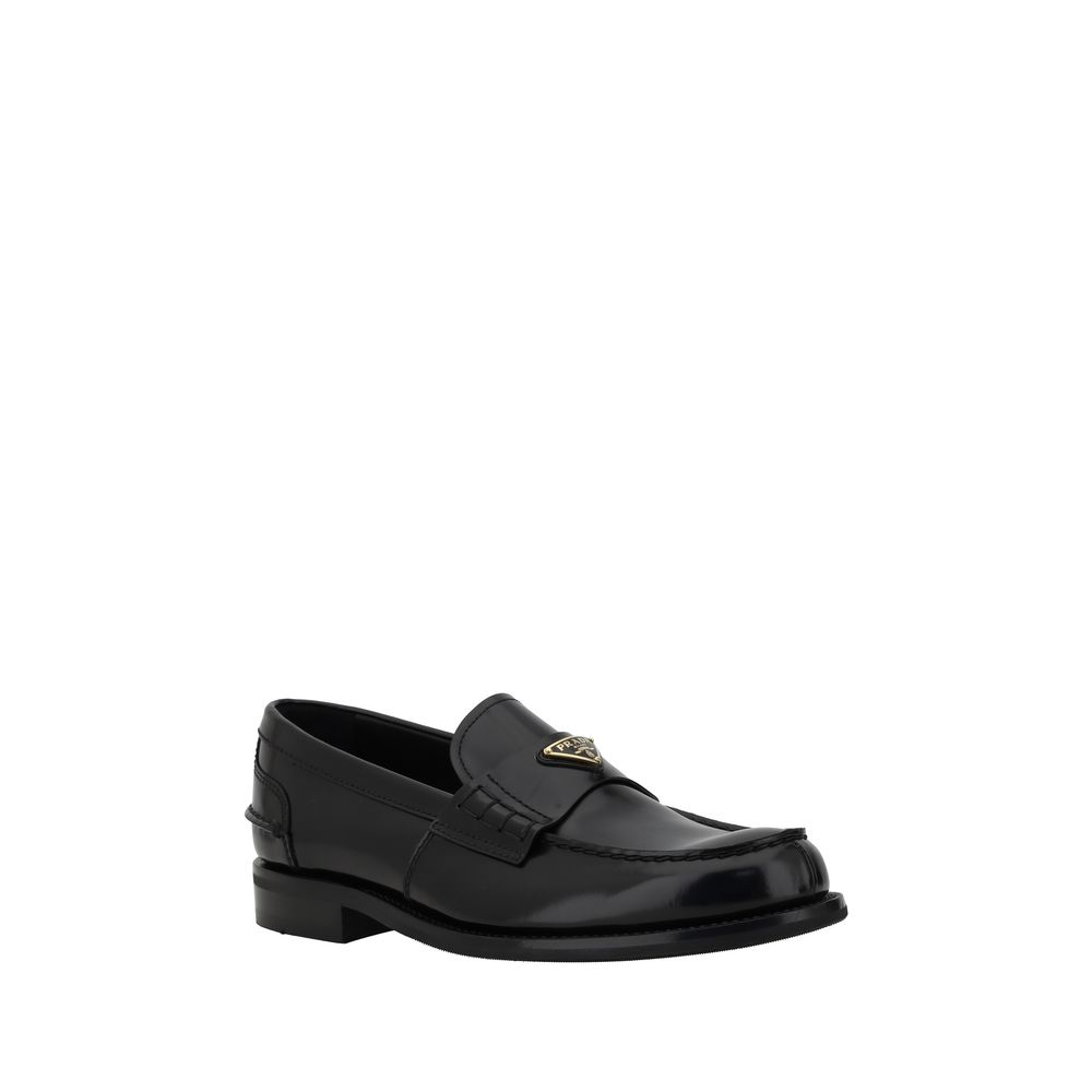 Mocasines con placa triangular de Prada