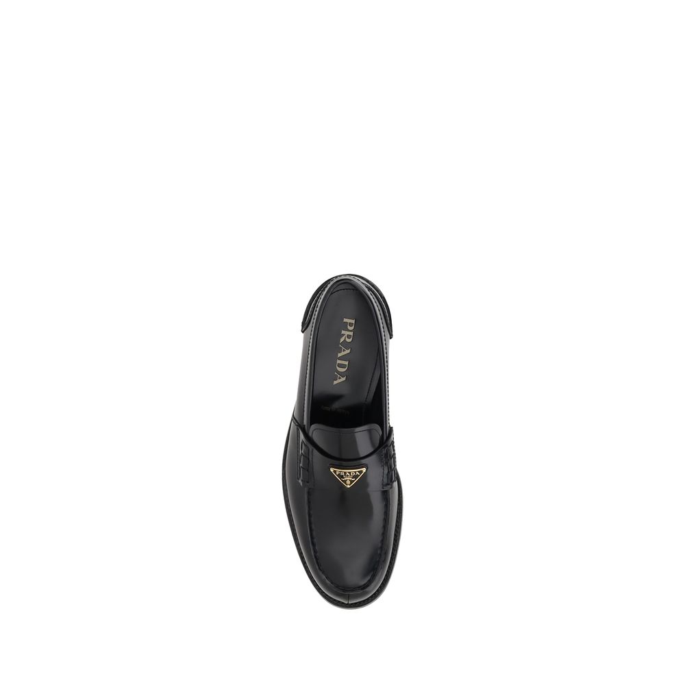 Mocasines con placa triangular de Prada