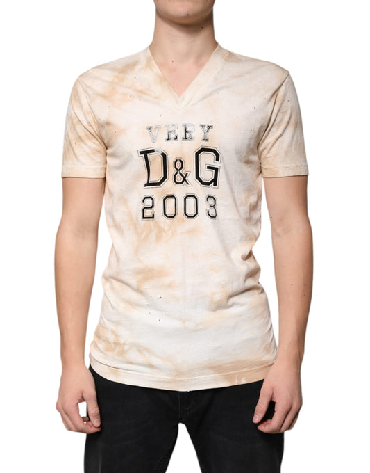 Dolce & Gabbana Beige Graphic Print Cotton V - neck T-shirt – IT48 | M par Dolce & Gabbana | Disponible sur Sandy Store ByNet