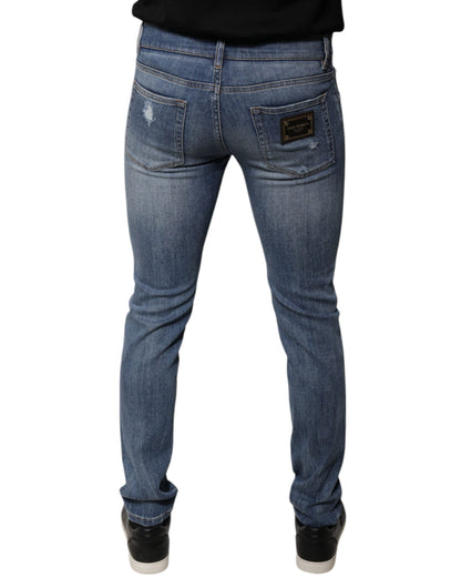 Vaqueros ajustados de mezclilla elástica de algodón azul desgastado de Dolce &amp; Gabbana
