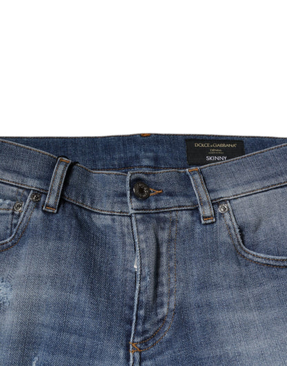 Vaqueros ajustados de mezclilla elástica de algodón azul desgastado de Dolce &amp; Gabbana