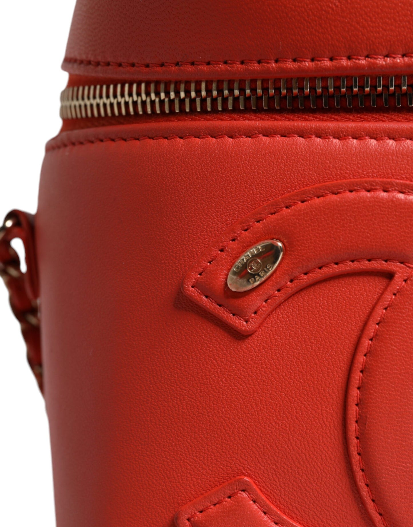Bolso de mano con cadena y diseño de coco naranja de Chanel