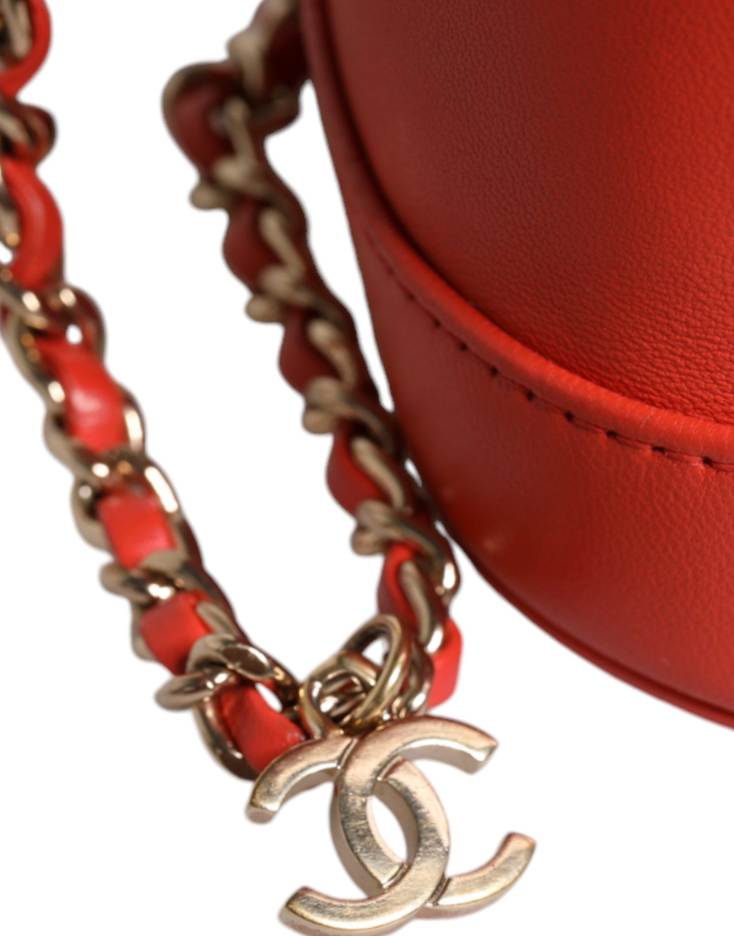 Bolso de mano con cadena y diseño de coco naranja de Chanel