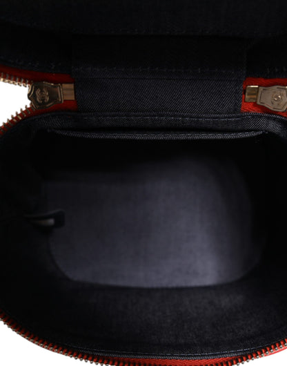 Bolso de mano con cadena y diseño de coco naranja de Chanel