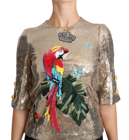 Dolce &amp; Gabbana Blusa dorada con cuello redondo y estampado de loros con cristales
